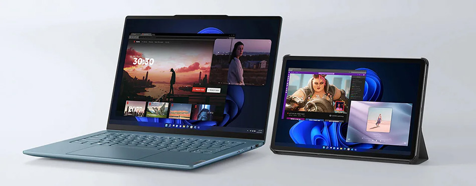 左側に青いラップトップがあり、その画面には映画のウェブサイトが表示されている。右側には黒いスタンドに支えられたタブレットがあり、ゲームのキャラクターが映っている。両方のデバイスは、マルチデバイスの使用シナリオを示している製品写真